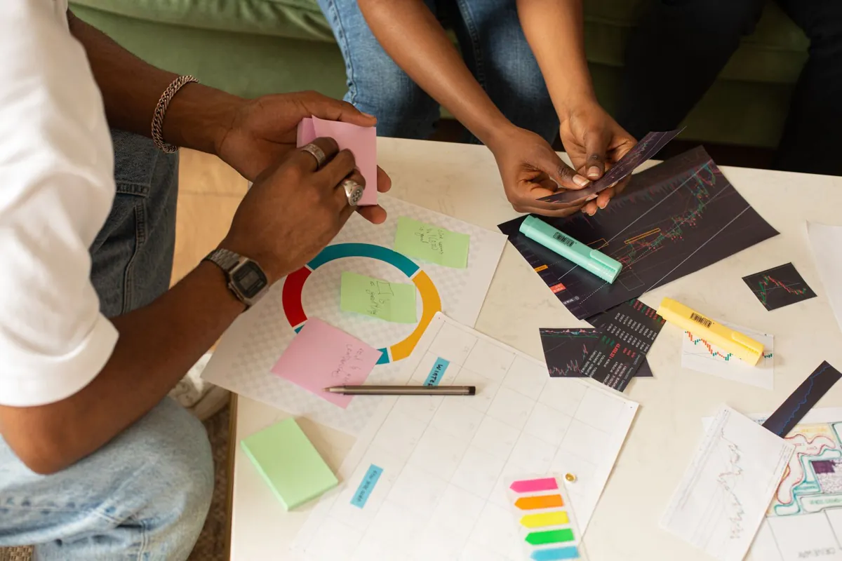 Project planning with charts and sticky notes