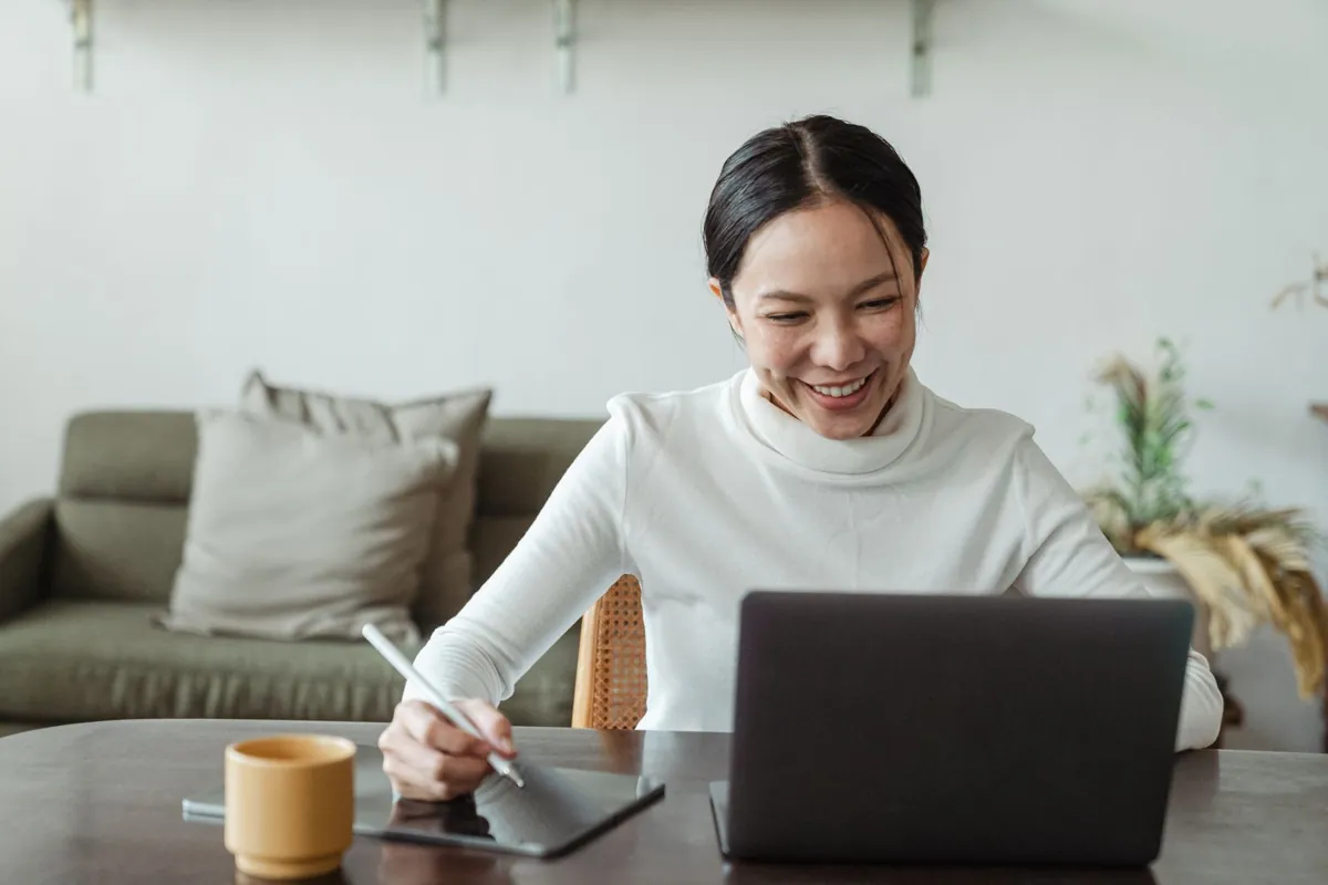 A remote video conversation with a laptop and tablet